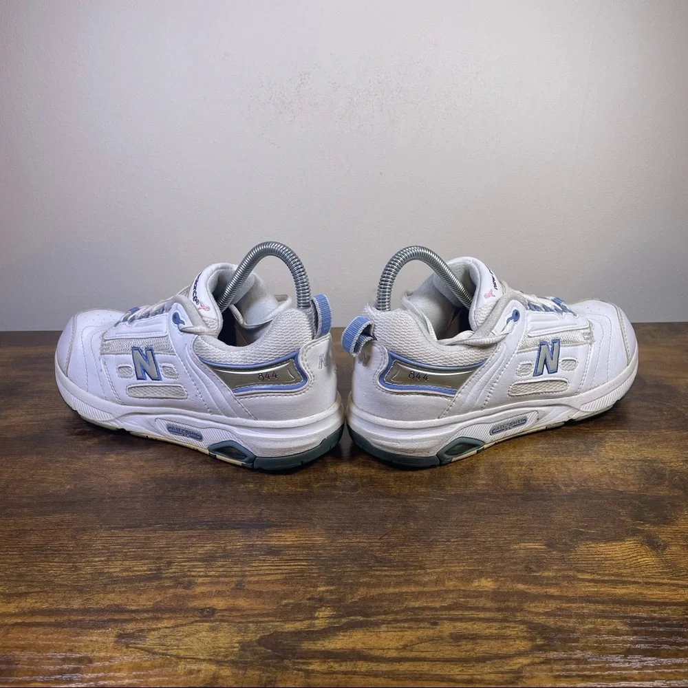 New Balance White Athletic Sneakers with Blue Accents